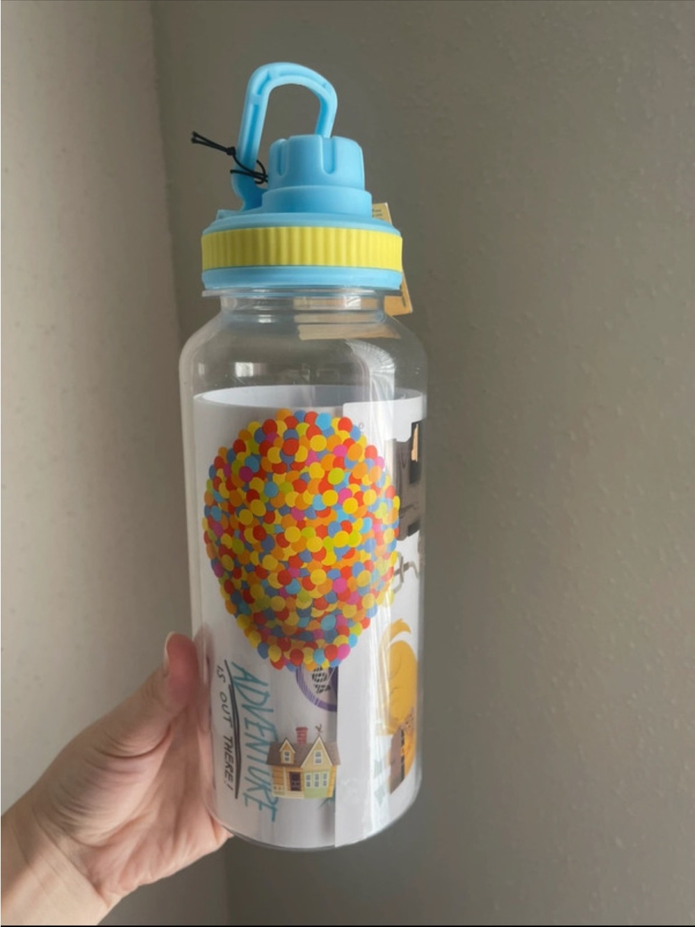 Disney Pixar Clear Sticker Water Bottle with Yellow & Blue Accents